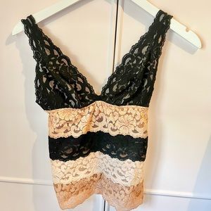 Beautiful lace top with a deep V